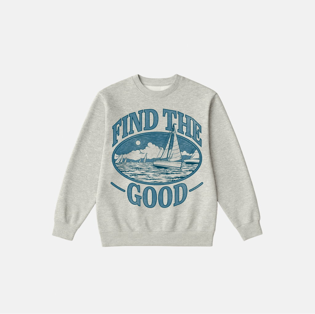 Gray sweatshirt with 'Find the Good' graphic design on a white background